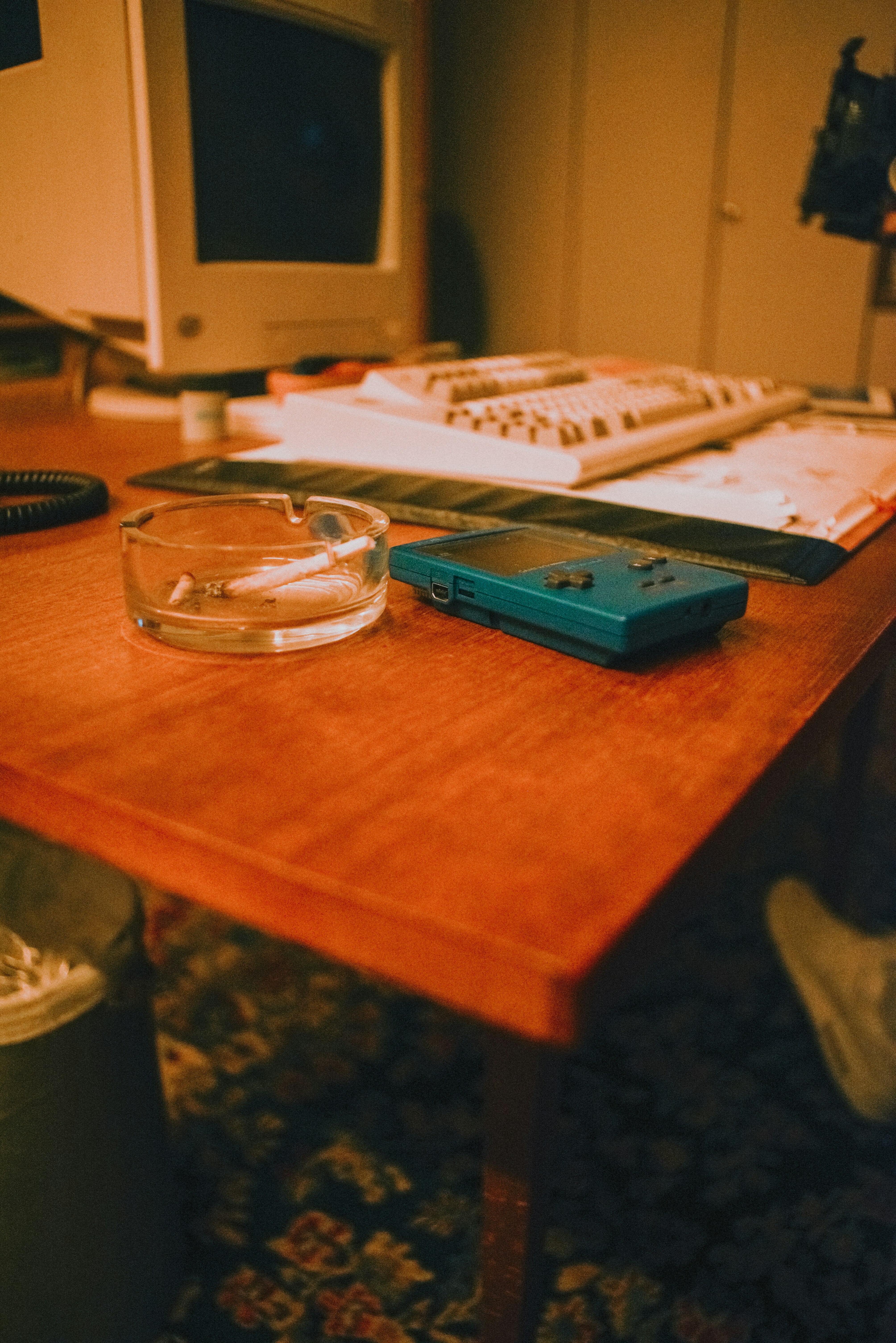 blue and white smartphone case on brown wooden table